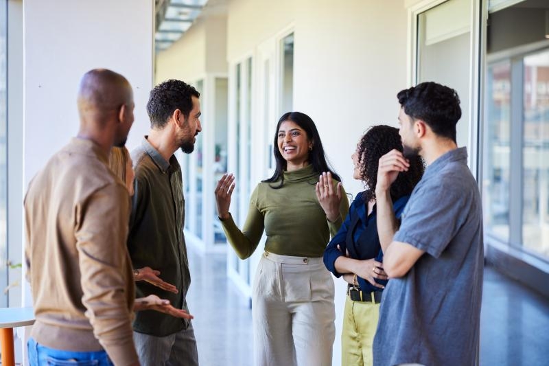 Group of people standing and talking