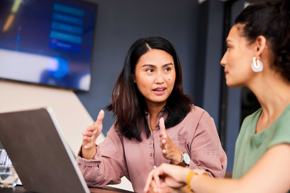women working on computer