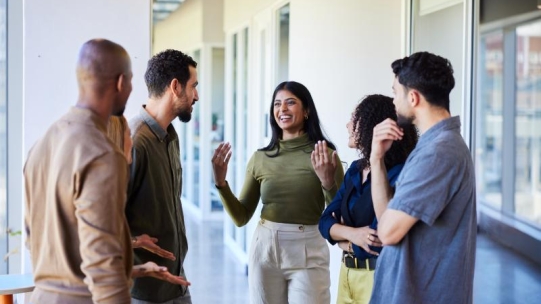 Group of people standing and talking